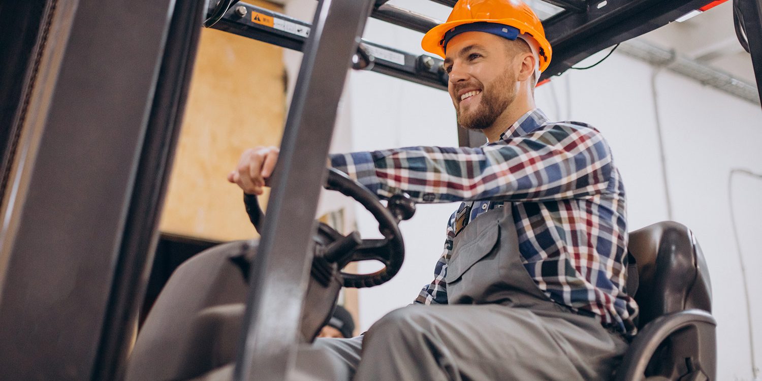 man-working-warehouse-driving-forkliftk